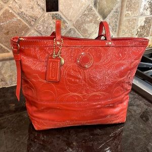 EUC Coach Patent Pumpkin Colored Purse w Embroidered Logos